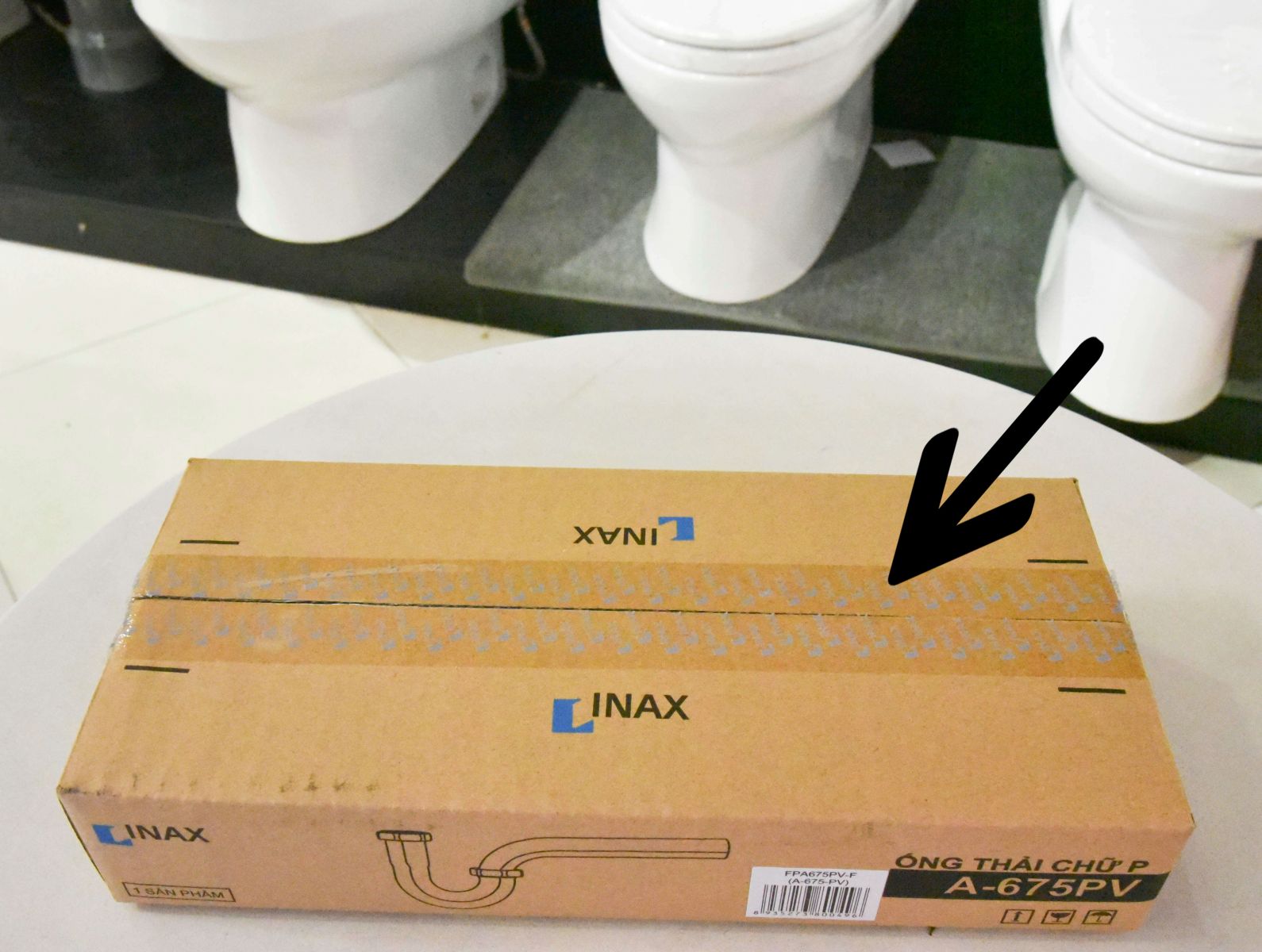 Băng kéo dán Inax có in logo bạc - tem Inax chống giả