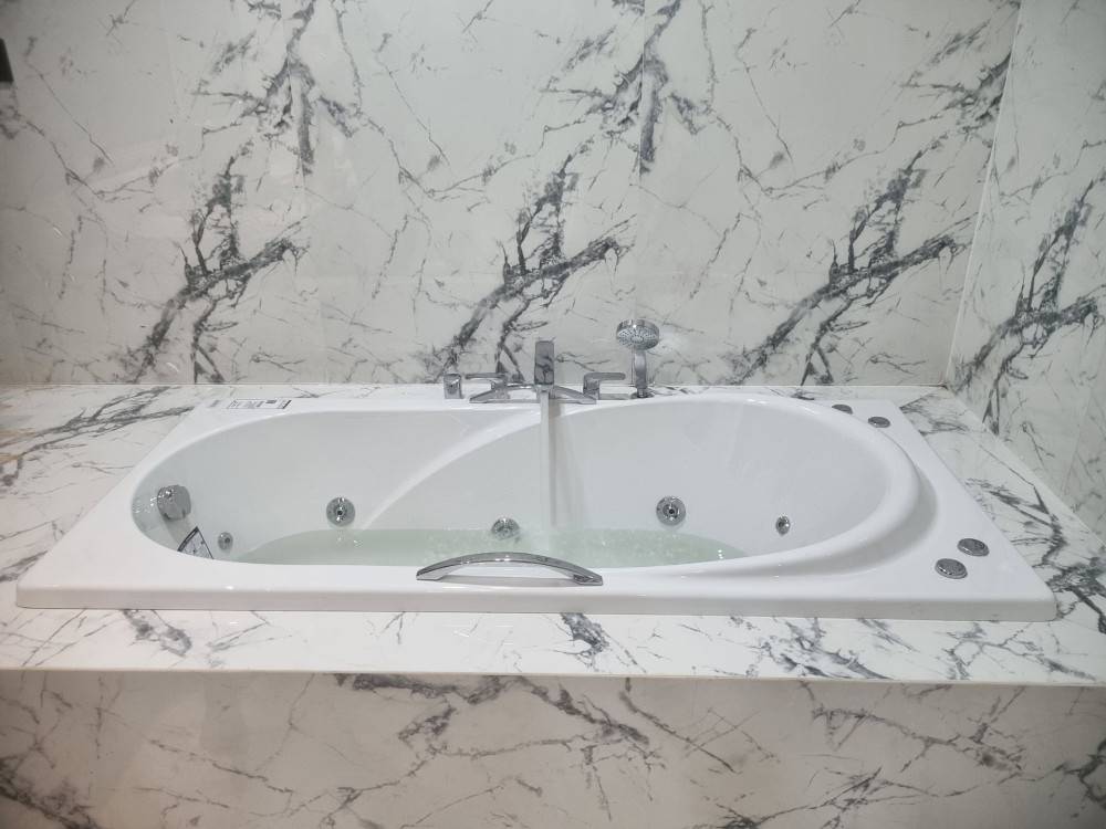 Đánh giá sản phẩm Bồn tắm COTTO BWA1052PP massage xây bệ